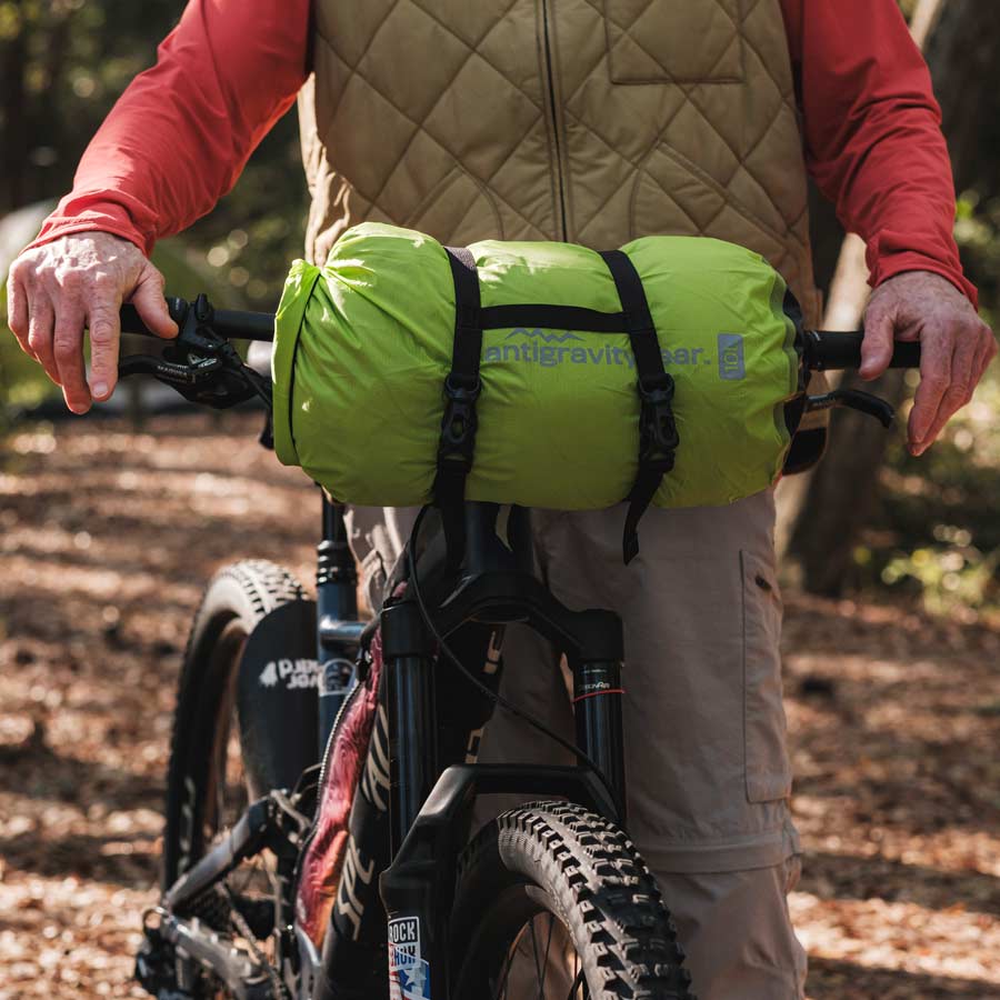 AntiGravityGear dry bag mounted on mountain bike handlebars